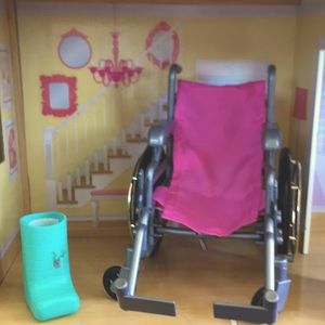 Our generation wheelchair and cast gently used four dolls